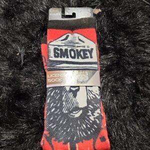SMOKEY BEAR LICENSED SOCKS . PUGS  1 PAIR. NEW IN PACKAGE.